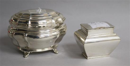 A late Victorian silver tea caddy by Charles Stuart Harris, London, 1896 and a smaller silver tea caddy, London, 1899, 11 oz.